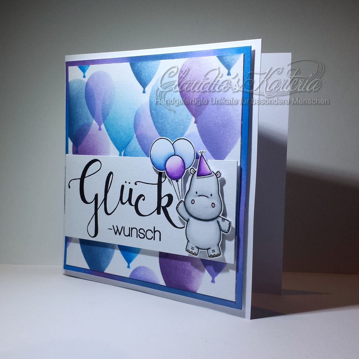 Ballonige Hippo-Wünsche in violet/blau | Glückwunschkarte