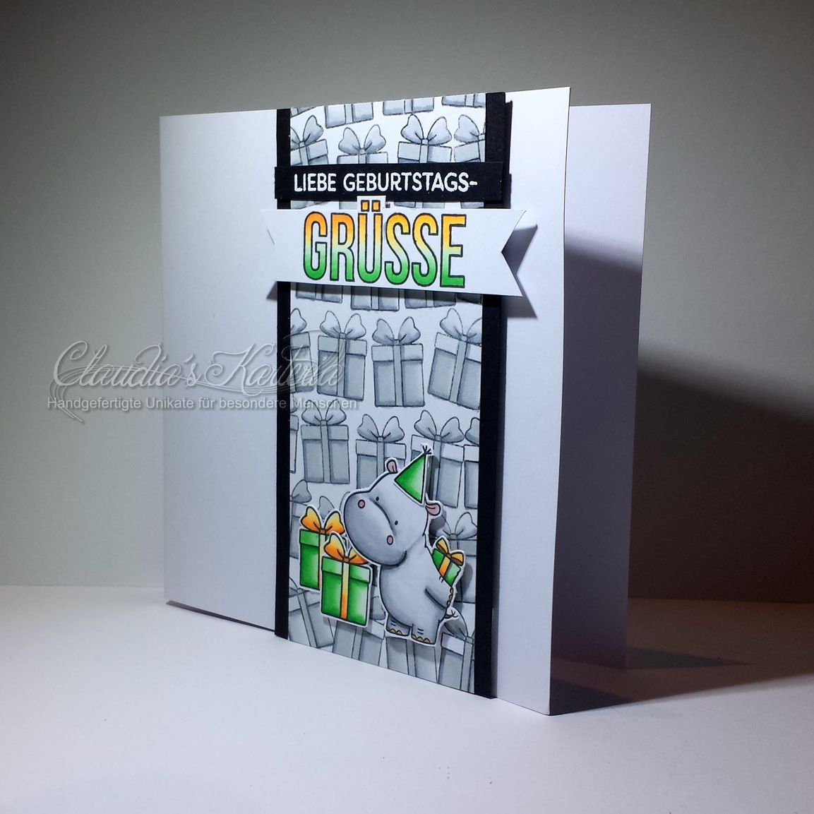 Hippo im Geschenke-Meer grau/grün/orange| Geburtstagskarte