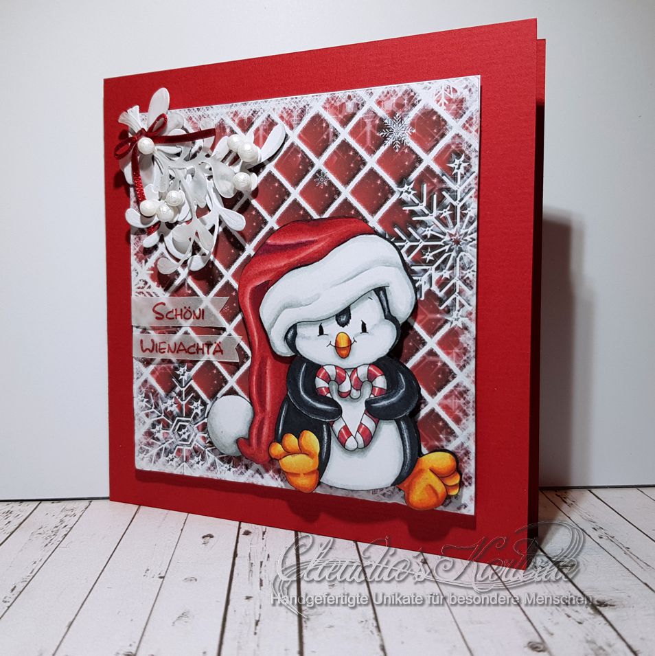 Zuckerherziger Pinguin unter Mistelzweig - rot | Weihnachtskarte